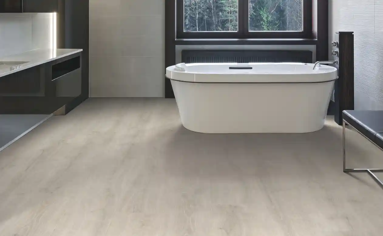 laminate flooring in bathroom with tub